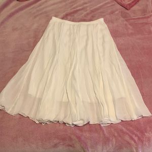 Beautiful, flowing, white, mid-length skirt in like new condition.